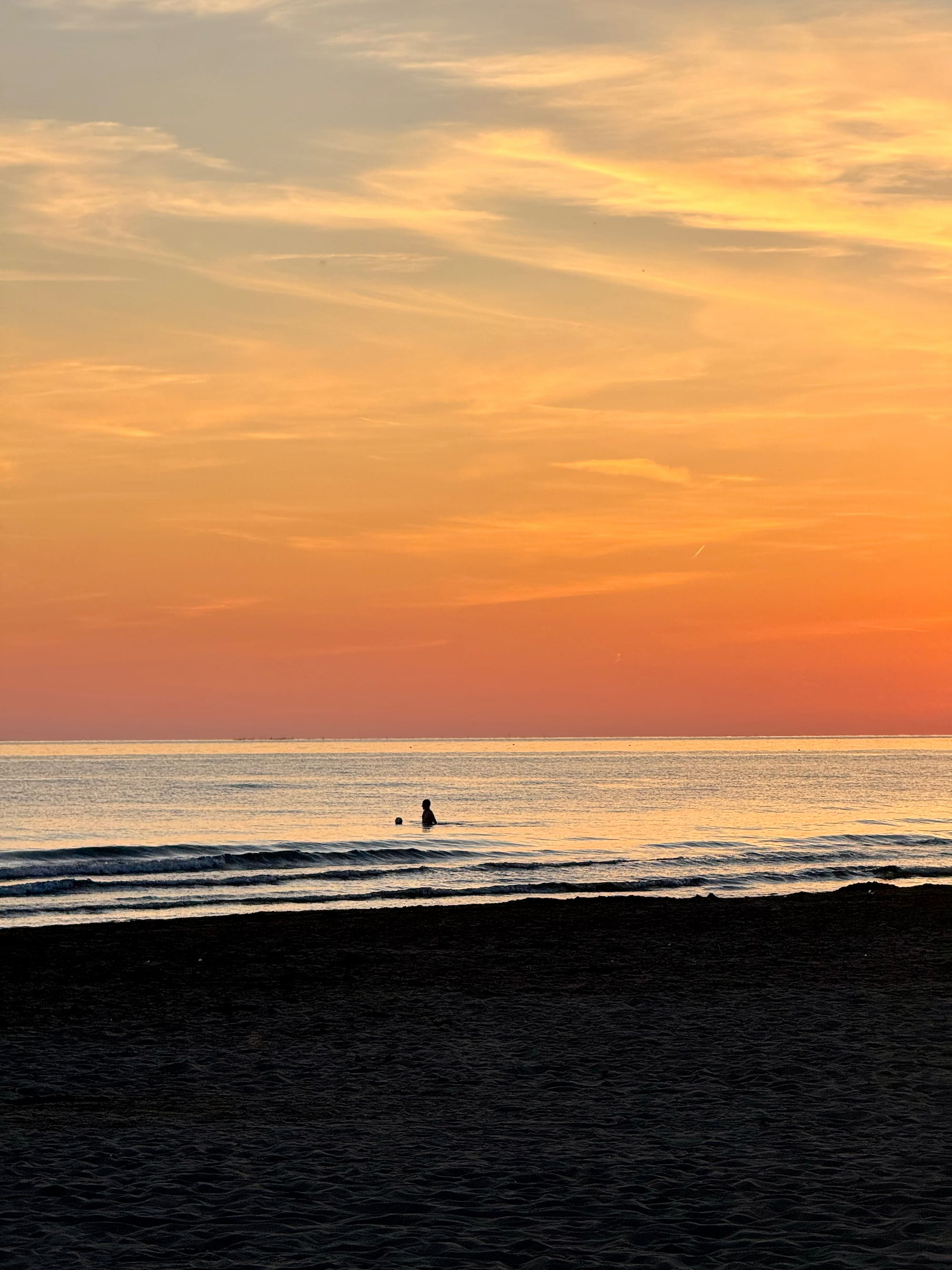 Orange sunset over Lalzi Bay